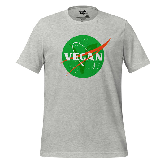 The image is of an athletic heather t-shirt with a logo that says "VEGAN". It is a NASA-inspired space parody design from the Unruly Folk brand.